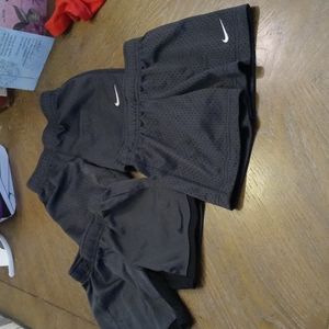 3 pairs of Nike shorts. One of the gray pairs are 3t. The other are 2t. Like new